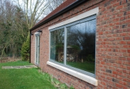 Elite 92, triple glazed, inward opening timber windows and matching doors. North Nottinghamshire.